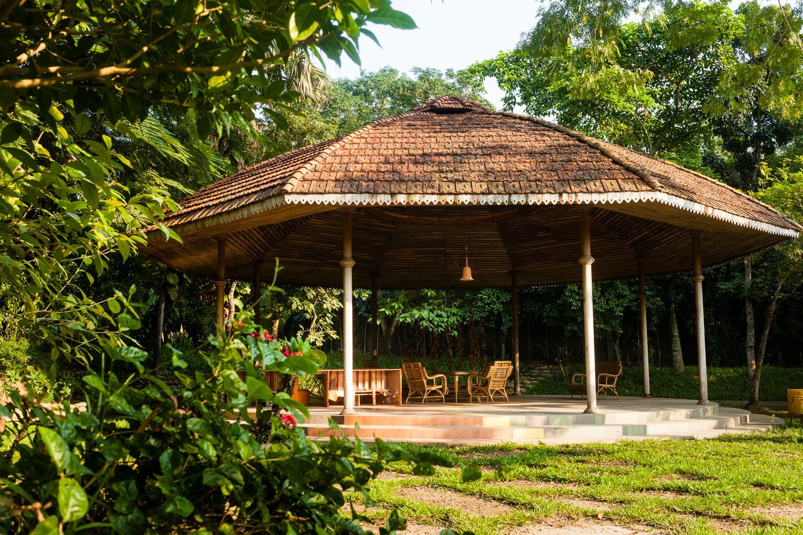 Cottage surrounded by greenery at Aranya Eco Resort